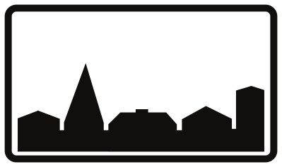 Panneau indiquant le début de l’agglomération